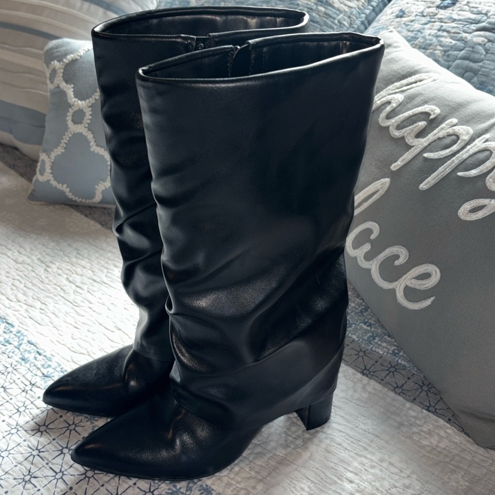 Unisa high heeled boots size 8.